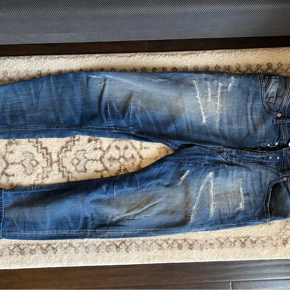 Diesel Blue Relaxed Fit Jeans with Distressed Detailing